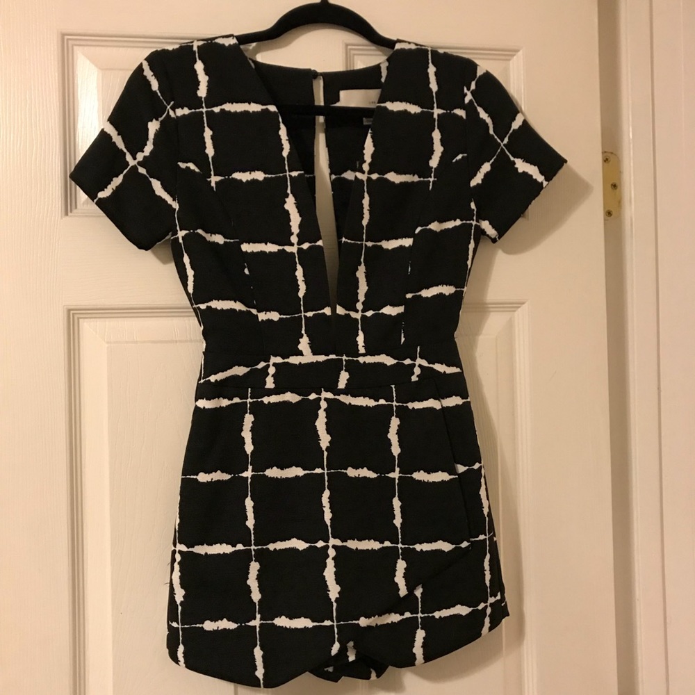 J.O.A. Black plunge neckline romper. Never worn